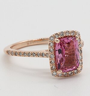 a ring with a ruby stone